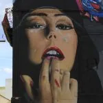 Portogallo, Olhao: street art gallery, murales, volto di donna