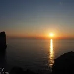 Capo Caccia Alghero Sardegna: foto sole rosso al tramonto
